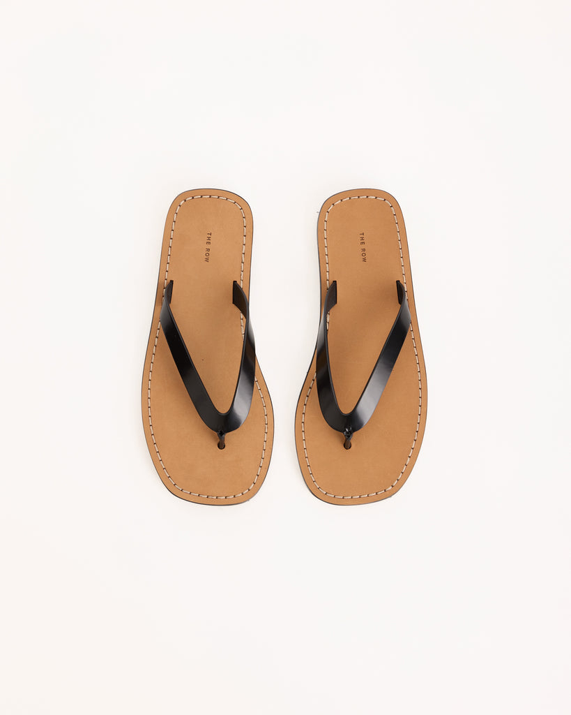 The Row City Flip Flop in black/natural