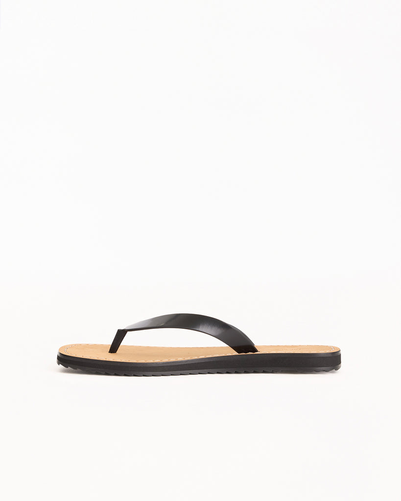 The Row City Flip Flop in black/natural
