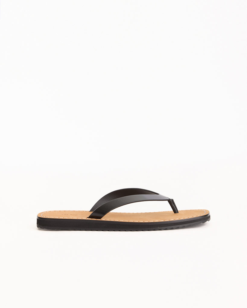 The Row City Flip Flop in black/natural