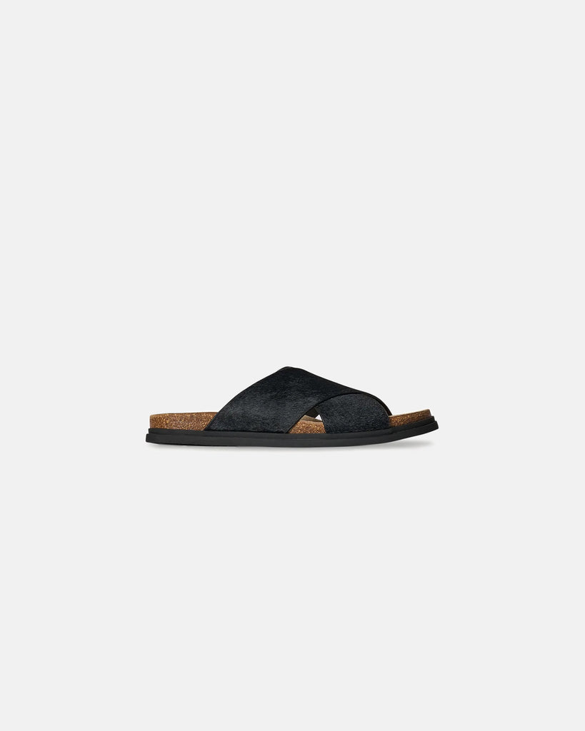 The Row Cross Sandal in blac