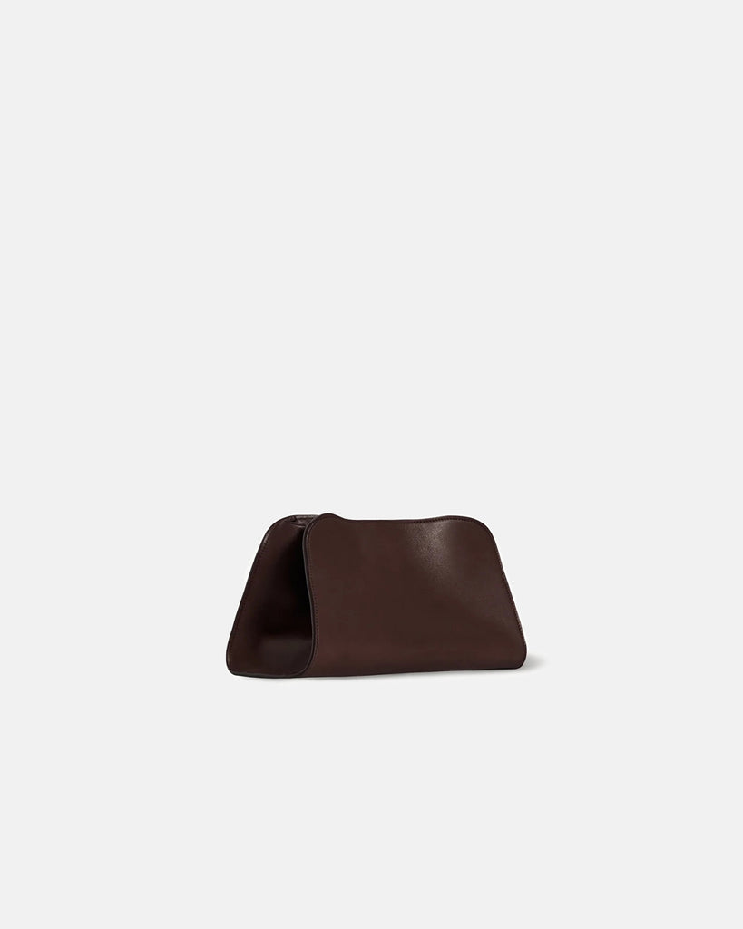 The Row Peggy Clutch in burgundy